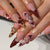 Künstliche Nagelkunst mit floralen und tierischen Motiven Brehn