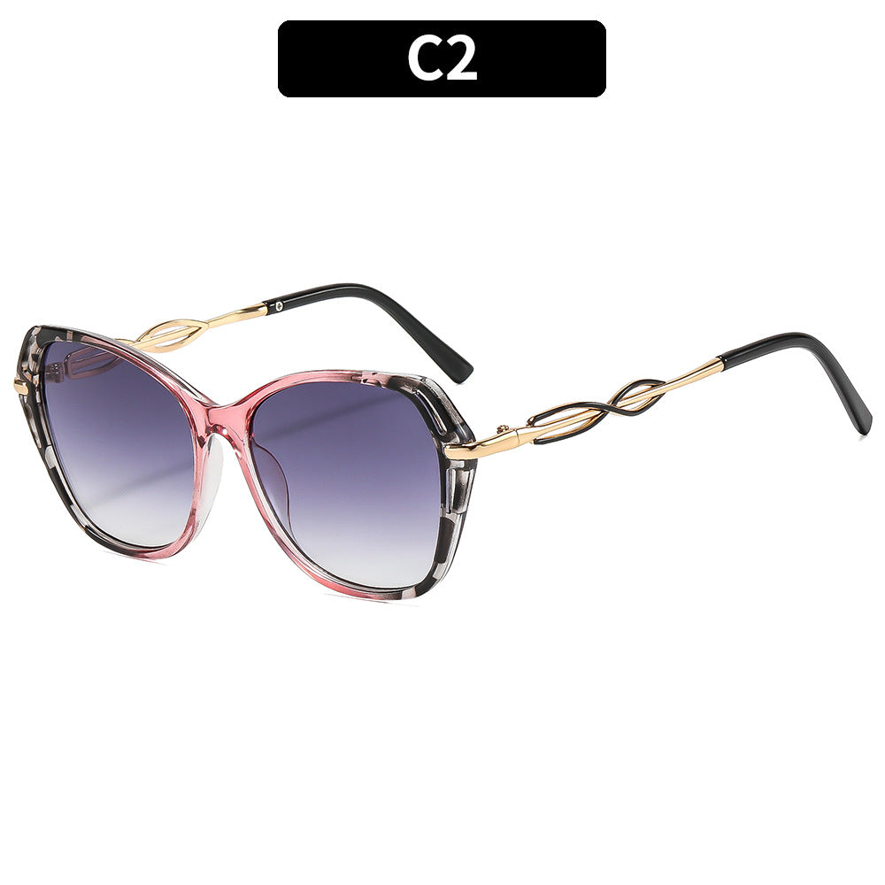 Stylische Cat-Eye-Sonnenbrillen mit eleganten goldenen Akzenten