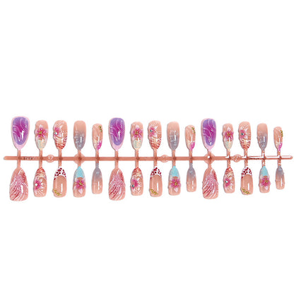 Kunstnagel-Set mit floralen und glitzernden Akzenten Brehn