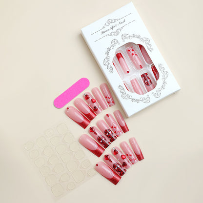 Luxus Press-On Nail Set mit glamourösen Herz- und Glitzerdesigns Brehn