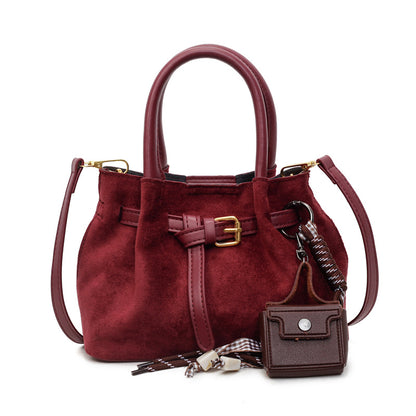 Elegante Wildleder Handtasche Brehn