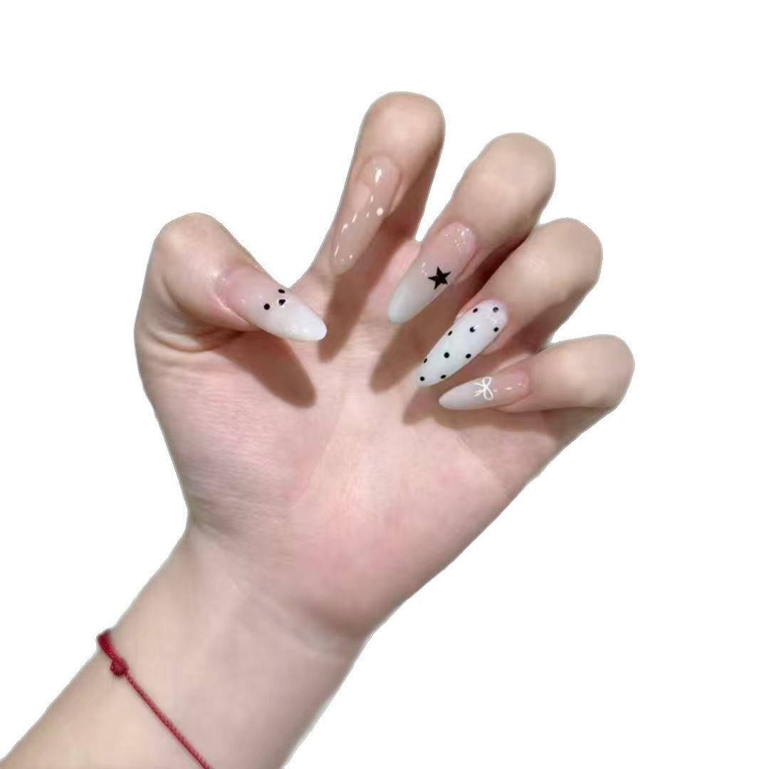 Künstlerisches Press-On-Nagelset mit Stern- und Punktemustern Brehn