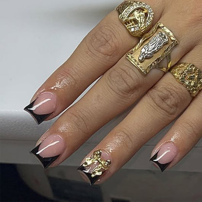 Kunstnagelset mit stylishen und eleganten Schwarz-Spitzen Brehn