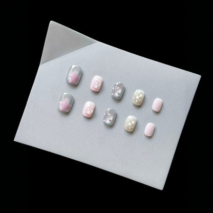 Dekoratives Press-On Nagelkunstset mit himmlischem Thema