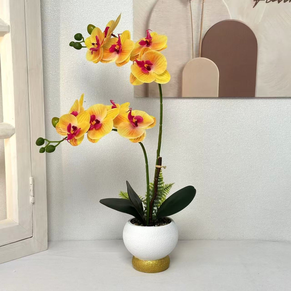 Elegante Kunstorchideen Topfarrangement