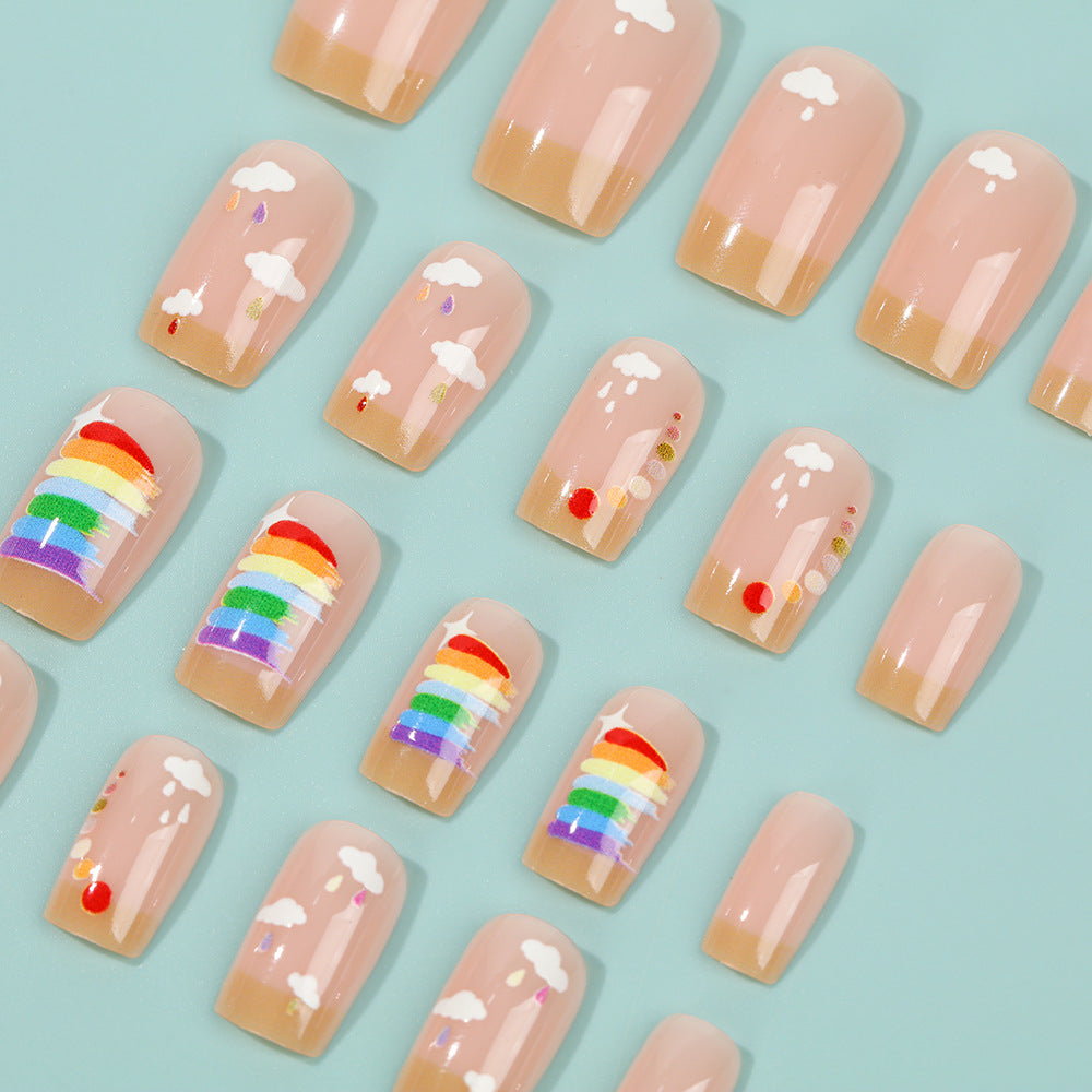 Kreatives Kunstnägel Set mit Regenbogen- und Wolkenmotiven Brehn