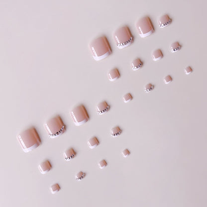 Fußnagelkunstset mit elegantem französischen Design und glitzernden Akzenten Brehn