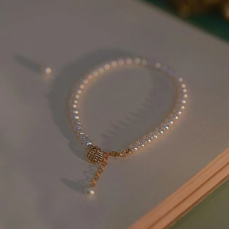 Elegante Perlen Charm Armband Brehn