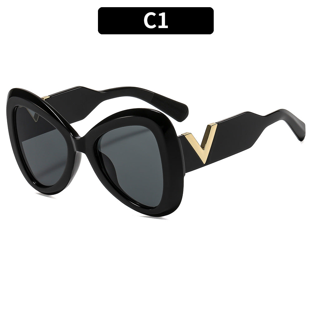 Elegante Cat-Eye-Sonnenbrille mit dekorativem Bügeldesign