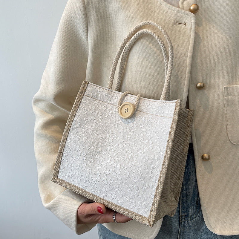 Elegante floral gemusterte Handtasche
