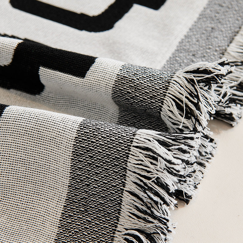 Elegante geometrische Muster-Wurfdecke