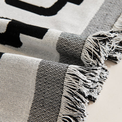 Elegante geometrische Muster-Wurfdecke