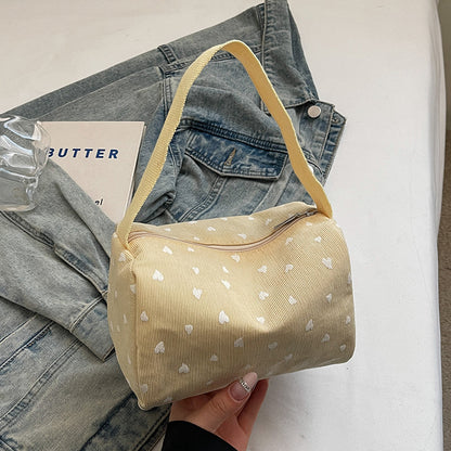 Hübsche Handtasche mit Herzmuster