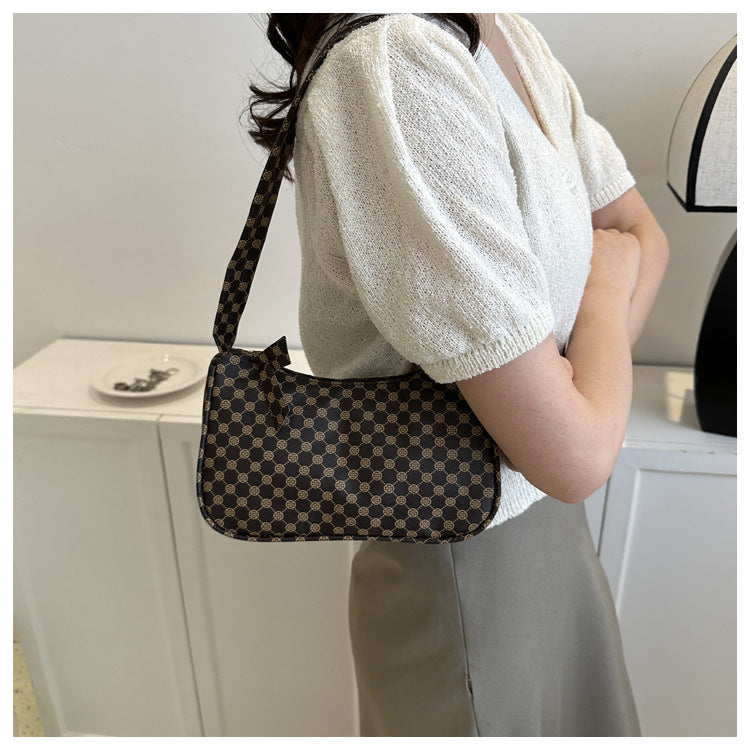 Stylische karierte Schultertasche