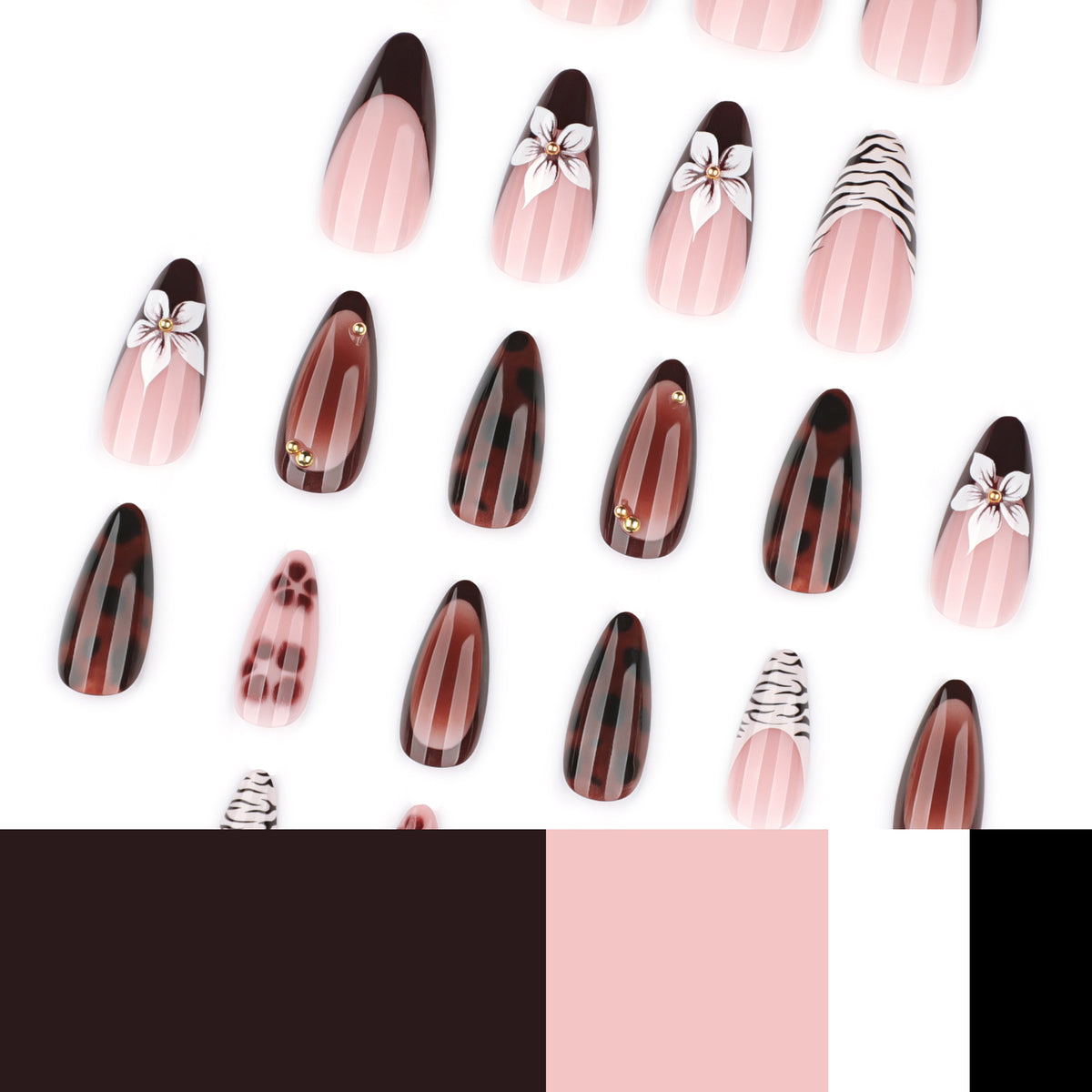 Kunstvolle Stiletto-Nägel mit eleganten Blumenmotiven und Glitzerakzenten Brehn