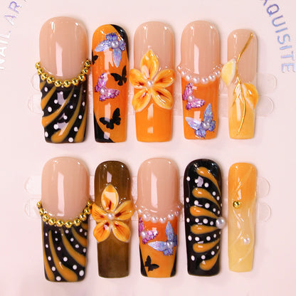 Kunstnagelset mit eleganten Blumen- und Schmetterlingsmotiven Brehn