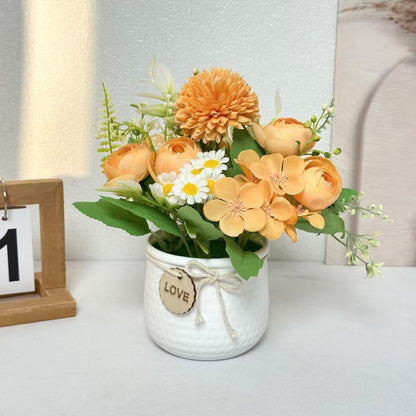 Florale Tischdekoration mit dekorativem Topf für Wohnkultur