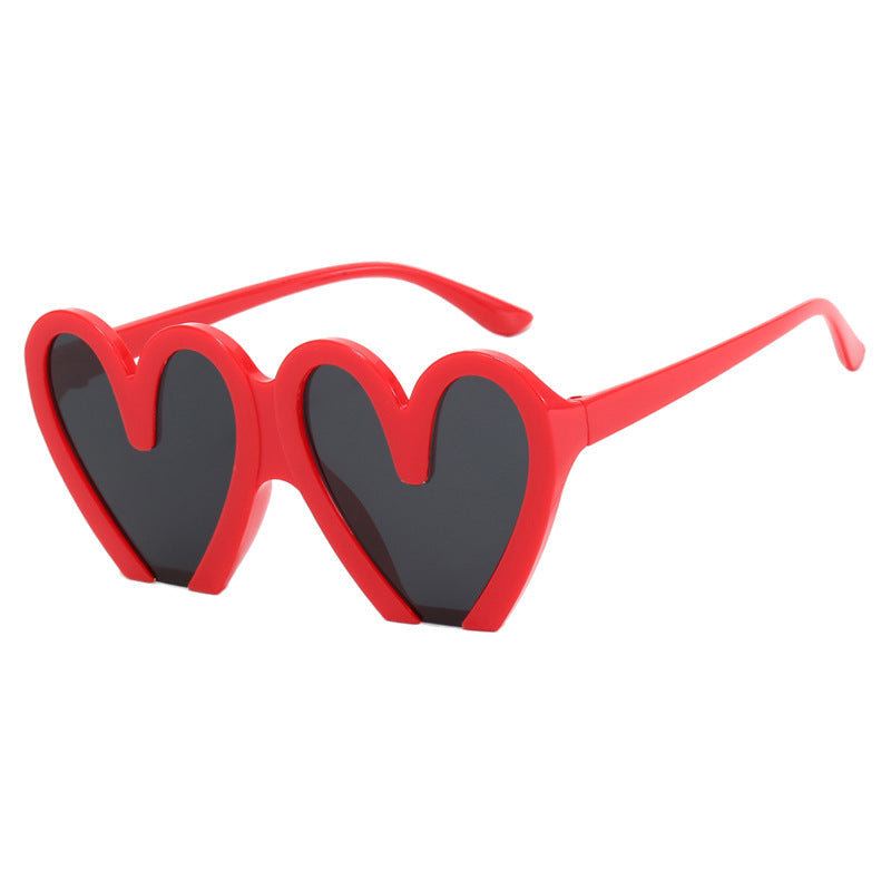 Damen Herzförmige Sonnenbrille mit robustem Kunststoffrahmen und UV-Schutz Brehn