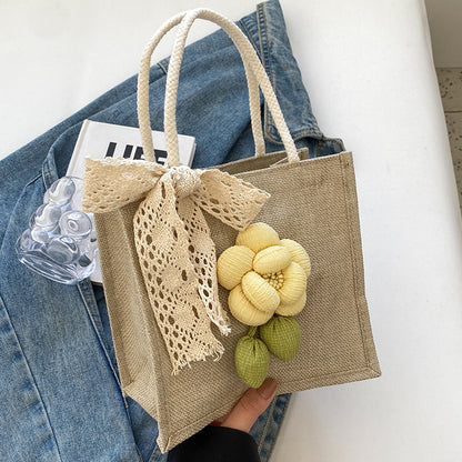 Blumenverzierte Tasche