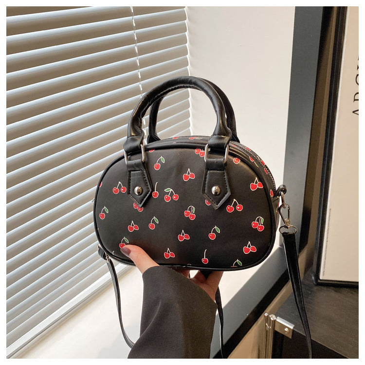 Verspielte Kirschen-Print-Handtasche Brehn