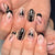 Dekorativer Press-On Nagelset mit künstlerischen Herz- und Stern Designs Brehn