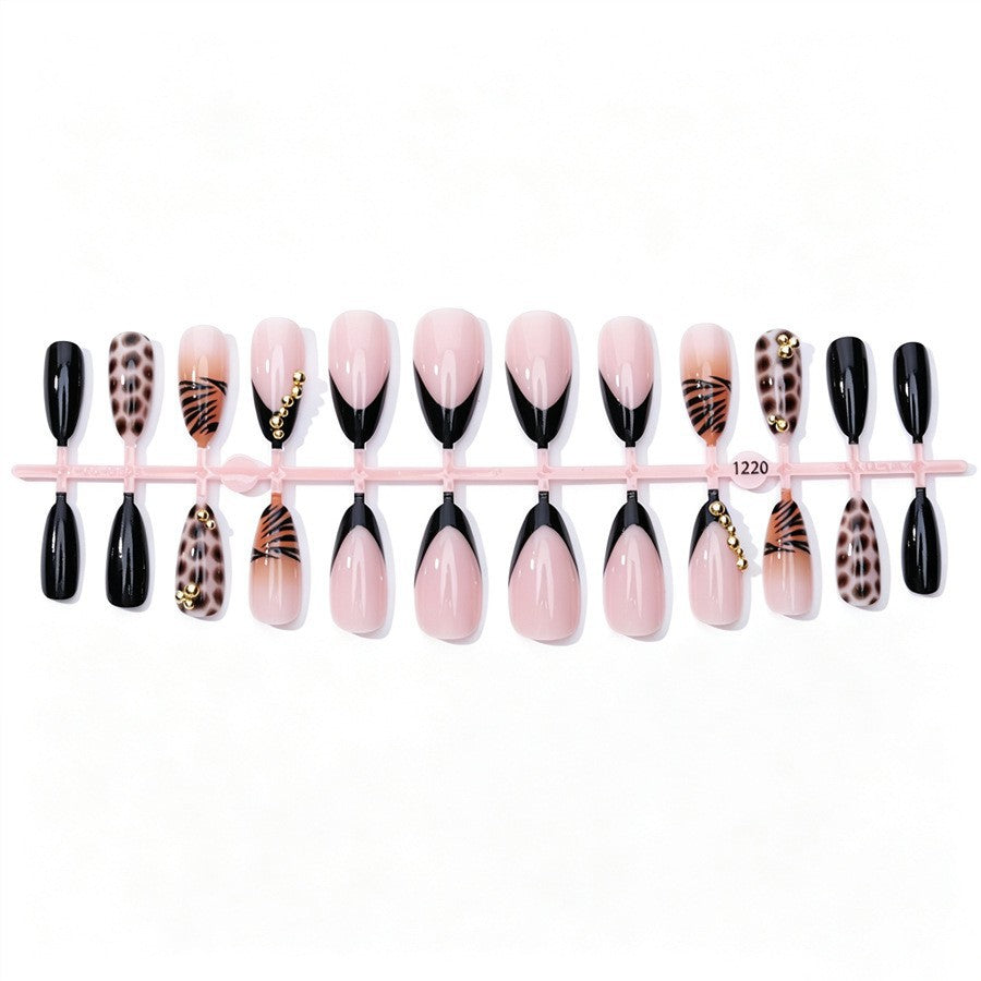 Kunstnagelset mit eleganten Tier- und Glitzermustern Brehn