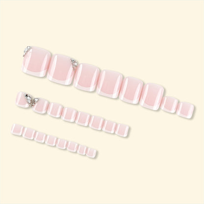 Kunstnagelset mit elegantem French Manicure und Glitzerakzenten Brehn