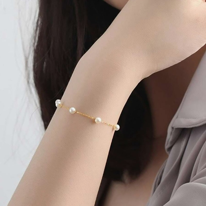 Elegante Perlenakzent-Kettenarmband Brehn