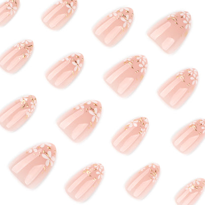 Kunstvolle Nagelkunst mit Floral-Design und Glitzerakzenten Brehn