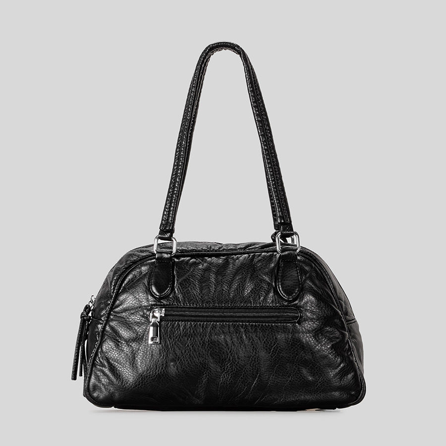 Multifunktionale Stepphandtasche