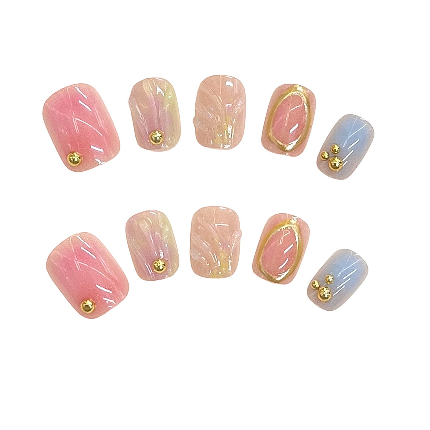 Dekorativer Press-On Nagelset mit goldenen Akzenten Brehn