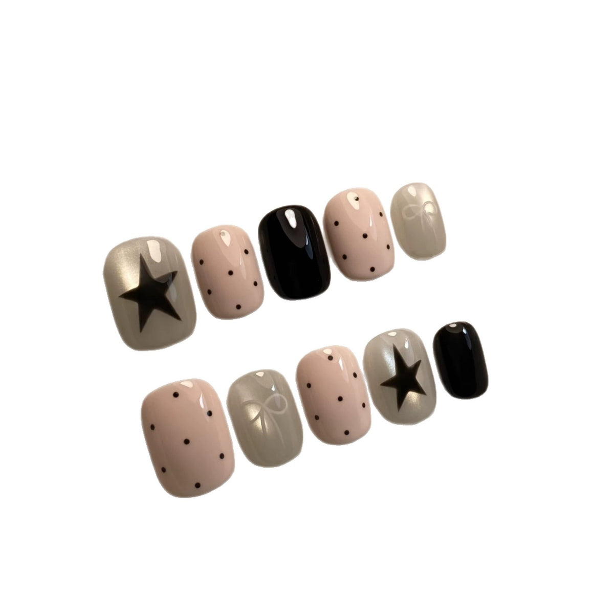 Künstlerisches Press-On-Nageldesign-Set mit stilvollen Stern- und Punktmustern