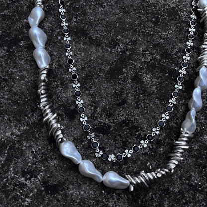 Modischer Ketten-Gürtel mit Perl- und Metallakzenten Brehn