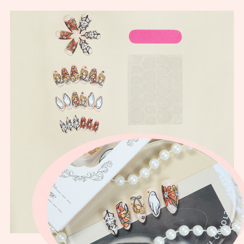 Künstlerisches Press-On-Nagelset mit saisonalen Blumen- und Geisterdesigns Brehn