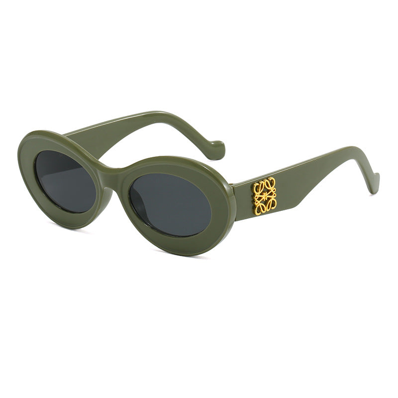 Damen modische Sonnenbrille mit ovalem Rahmen und goldenen Applikationen Brehn