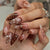Dekoratives Floral Langes Nagelset Brehn