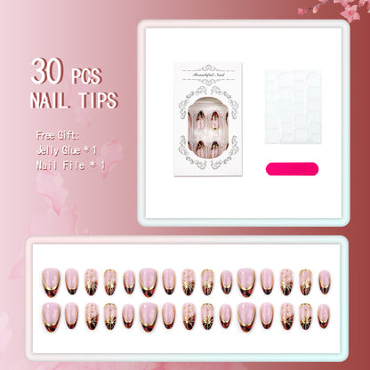 Elegantes Press-On-Nagelset mit hochwertigen Goldakzenten