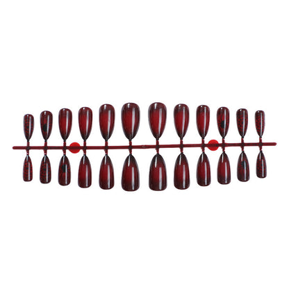 Kunstnagelset mit eleganten und tiefroten Nuancen Brehn