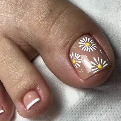 Kunstvolle Fußnagelkunst mit Blütenmotiven Brehn