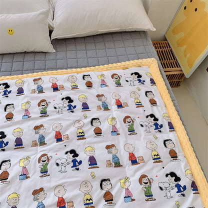 Kinder-Steppdecke mit buntem Dinosaurier-Print und weicher Minky-Borte