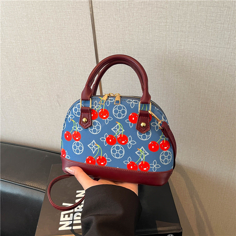 WoBestickte Kirschmuster-Handtasche Brehn