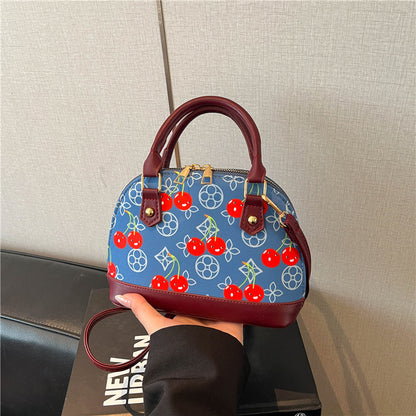 WoBestickte Kirschmuster-Handtasche Brehn