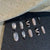 Künstlerisches Press-On Nagelset Brehn