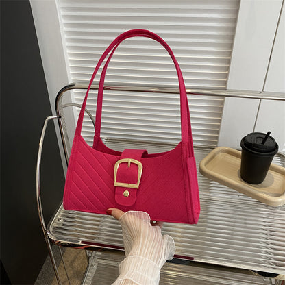 Strukturierte gesteppte Handtasche