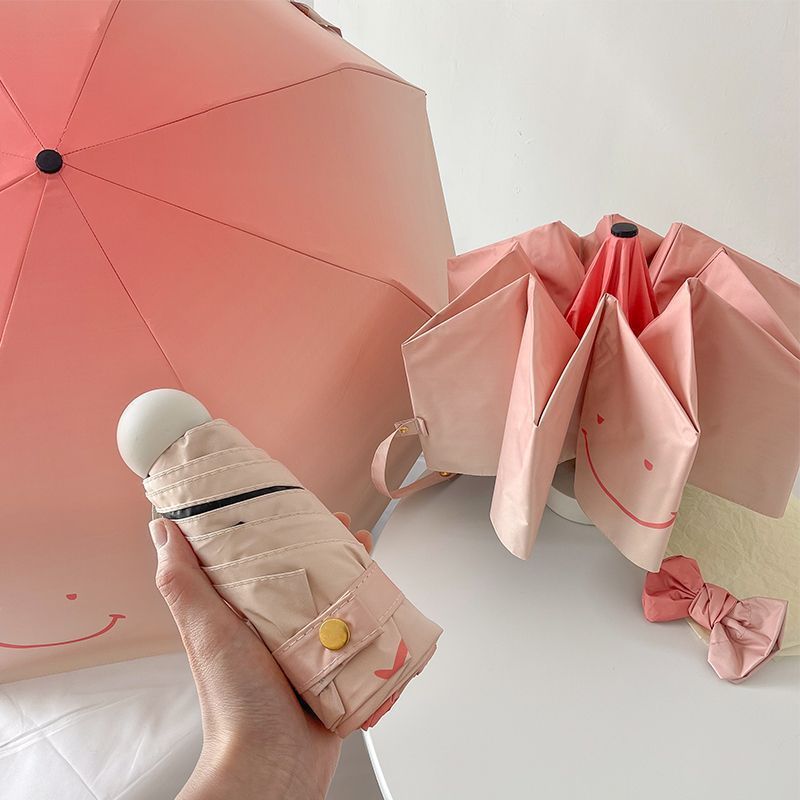 Damen Faltregenschirm mit verspieltem Design und handlichem Holzgriff Brehn