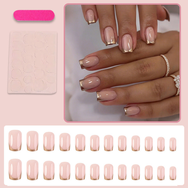 Kunstnagelset mit elegantem Gold-French-Tip Brehn