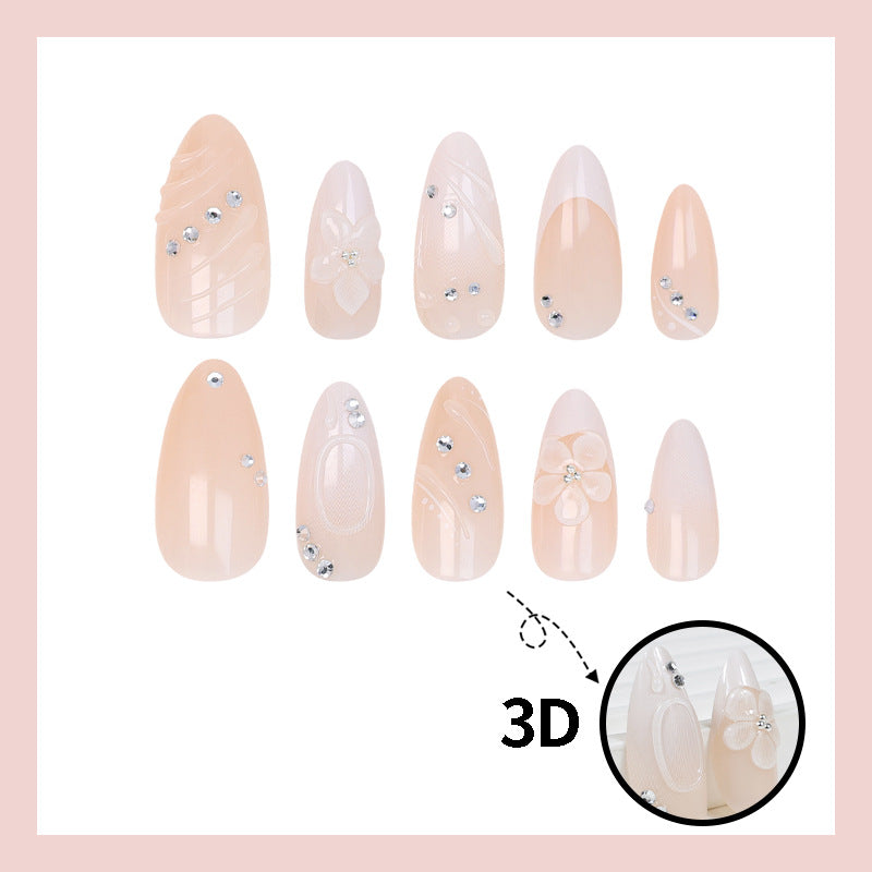 Kunstnagelset mit eleganten Blumen- und Glitzerdetails Brehn