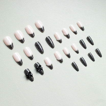 Elegantes Nagelkunst-Set mit Schleifenverzierungen