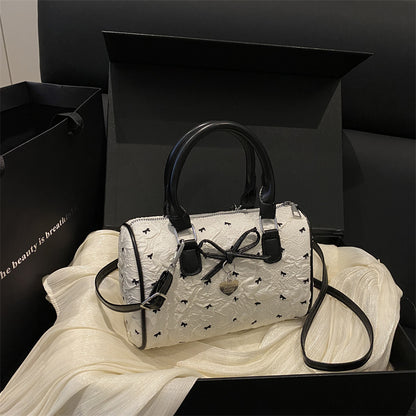 Bogen-verzierte Handtasche