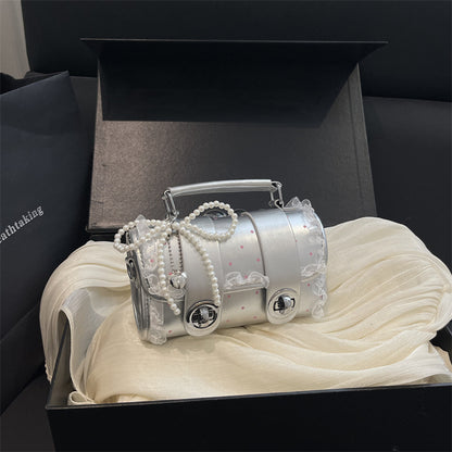 Dekorative kompakte Handtasche